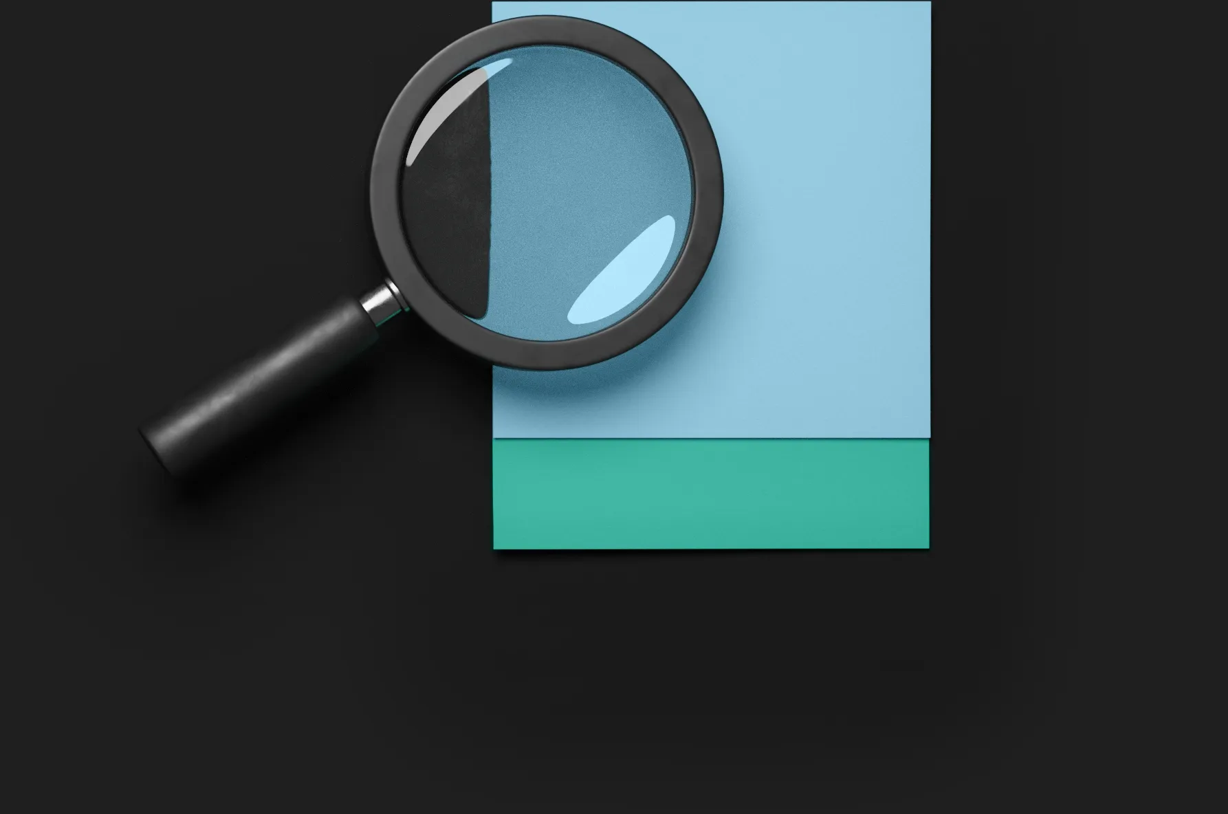 A magnifying glass on a notepad